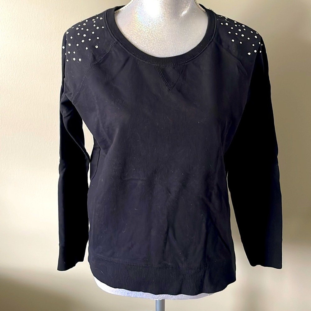 Style and Company, black crewneck sweatshirt with rhinestone shoulder accent.